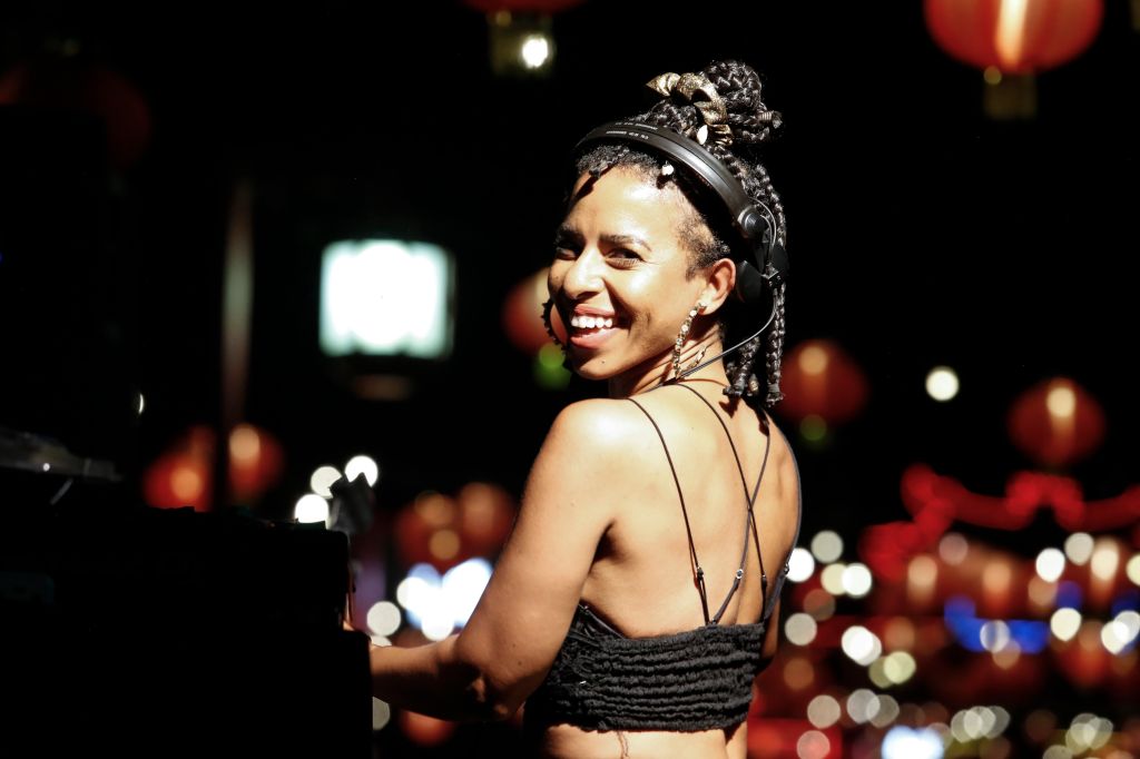 Novena Carmel, Daughter Of Sly Stone, Carves Her Own Legacy As Host Of KCRW’s ‘Morning Becomes Eclectic’